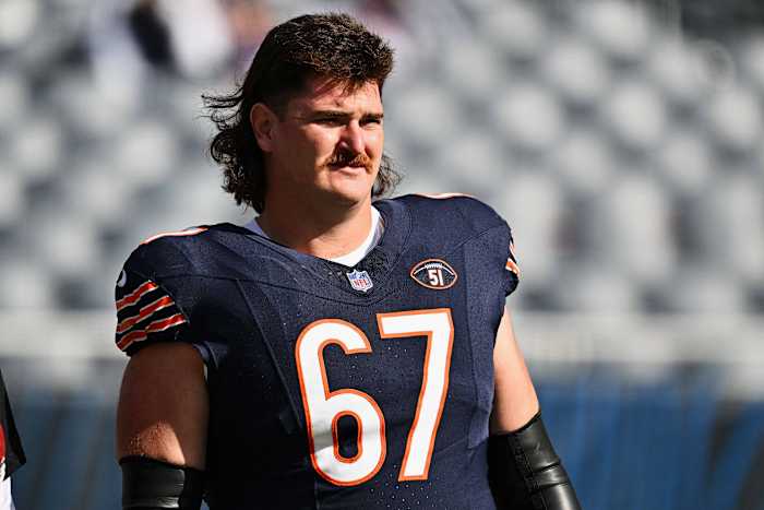 Oct 15, 2023; Chicago, Illinois, USA; Chicago Bears offensive lineman Dan Feeney (67) warms up before a game against the Minnesota Vikings at Soldier Field.